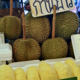 The famous Durian, known for it's pungent (to put it nicely) odor and heavanly flavor (to some). It has a hard spikey exterior and soft custard-like interior. Chef Andrew Zimmern compares the taste to "completely rotten, mushy onions". Anthony Bourdain, a lover of durian, relates his encounter with the fruit thus: "Its taste can only be described as...indescribable, something you will either love or despise. ...Your breath will smell as if you'd been French-kissing your dead grandmother."